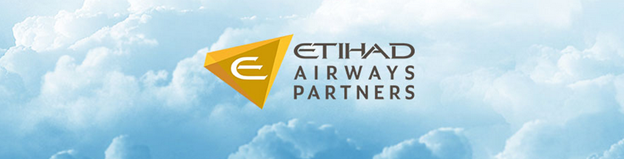 a logo with clouds in the background